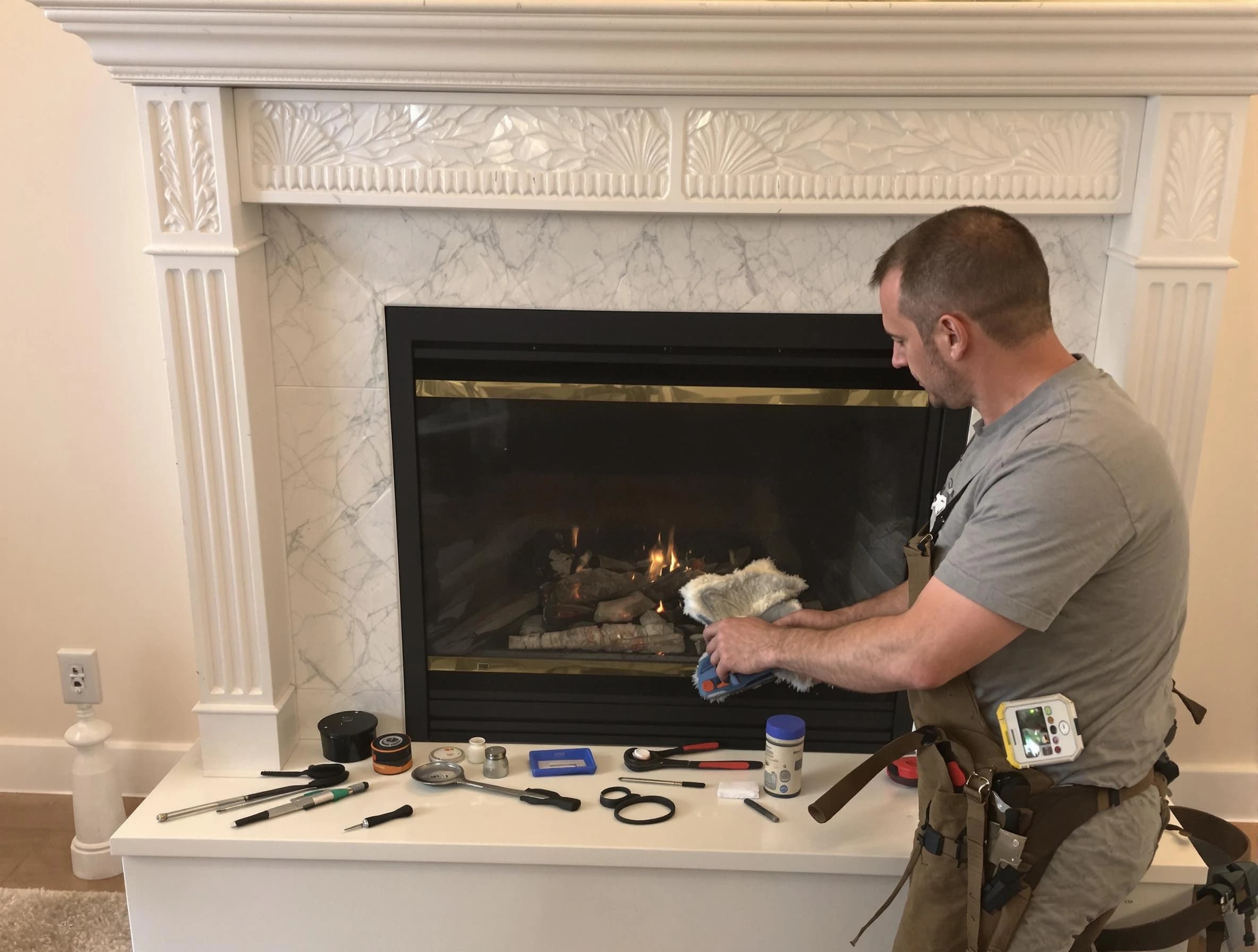 Paradise Valley Chimney Sweep performing fireplace maintenance in Paradise Valley, AZ